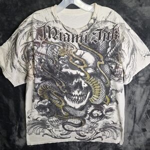 Miami Ink skull and snake graphic tee - bold black and white design #GrungeVibes